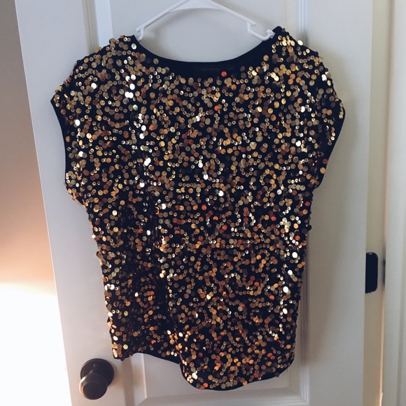 black top with gold sequins